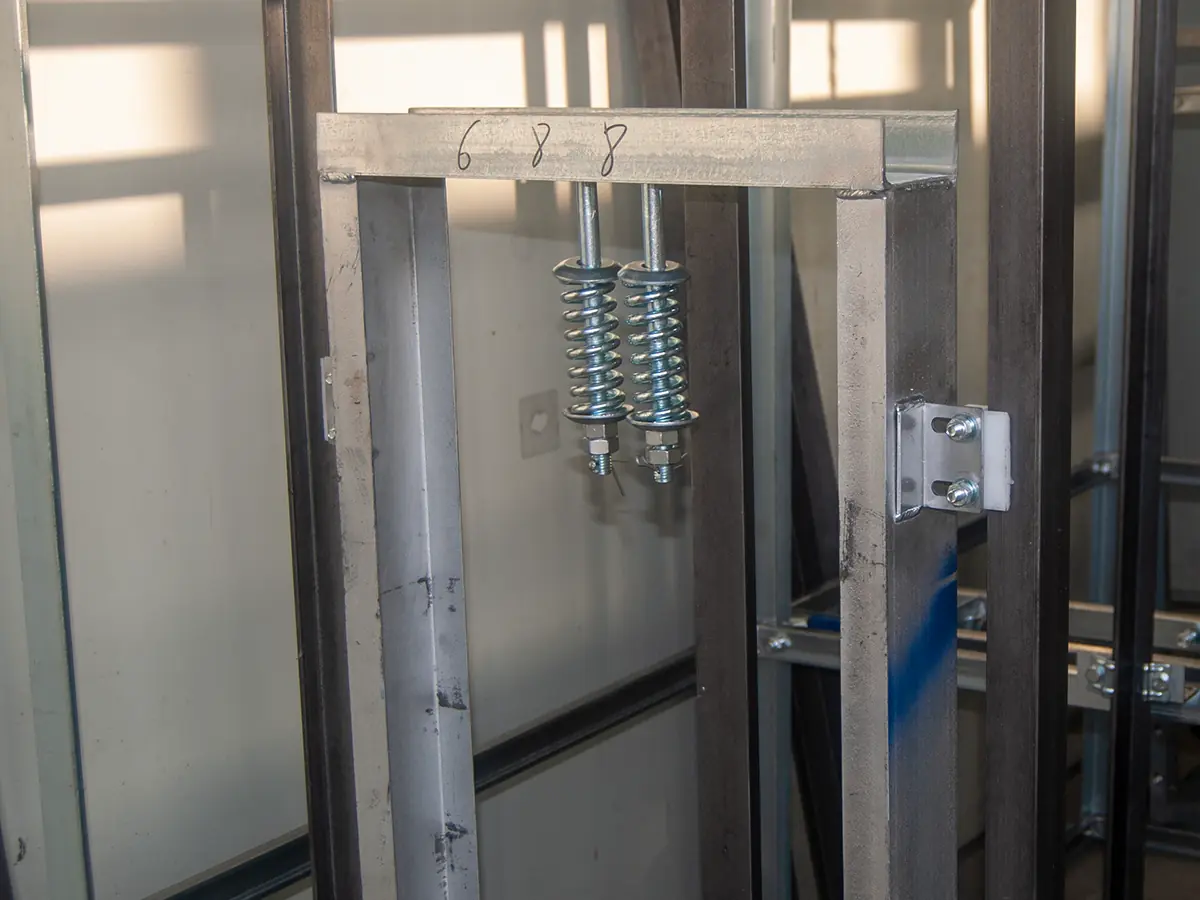 Dumbwaiter Middle East hotel project - stainless steel car frame with spring suspension
