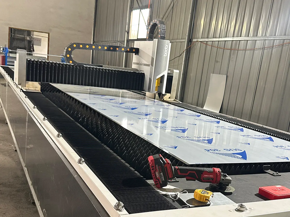 Laser cutting steel for dumbwaiter shaft frames in the ServLifts factory