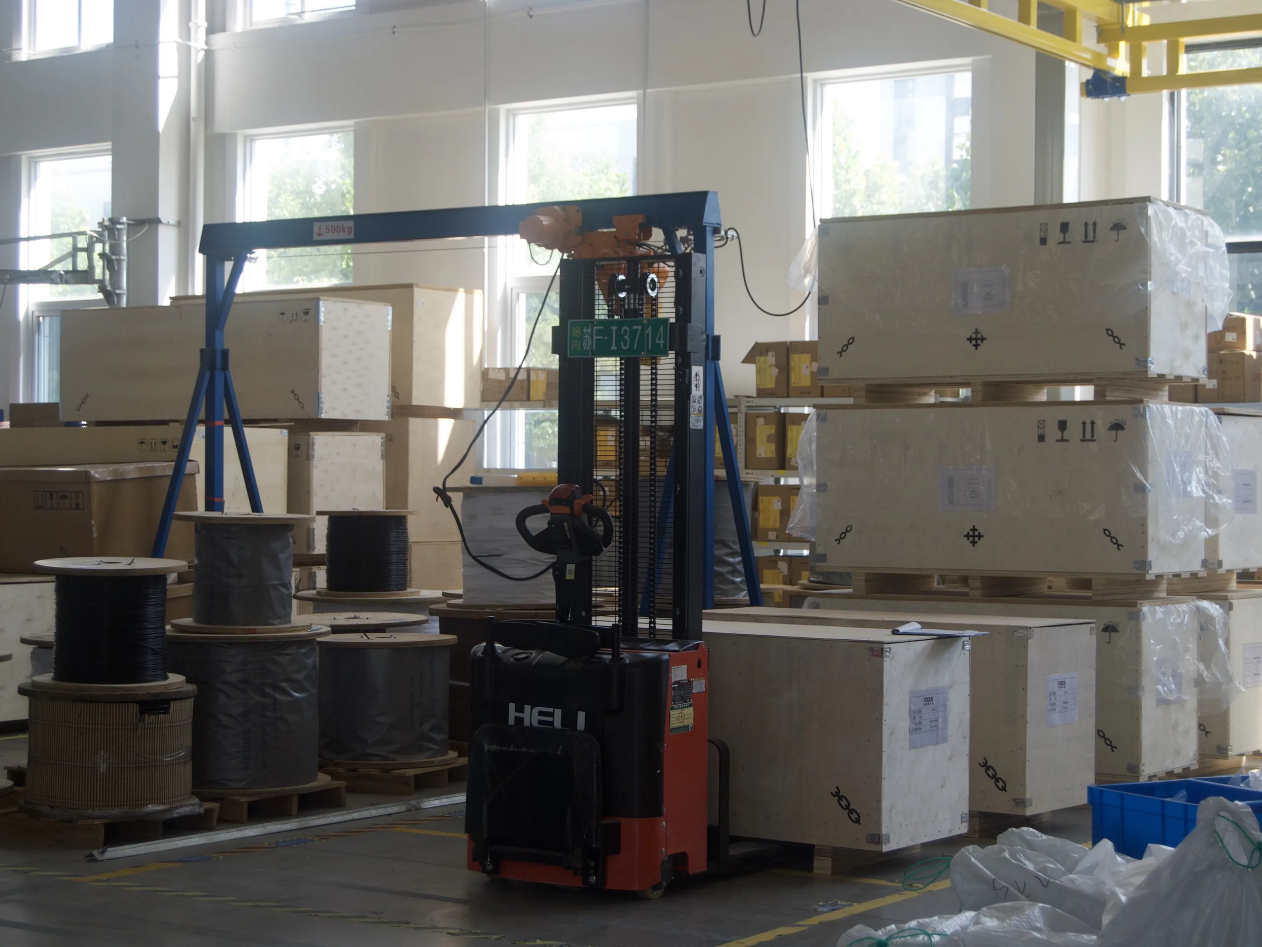 Dumbwaiter parts and packed units stored in the ServLifts warehouse in Wujiang, Suzhou, China